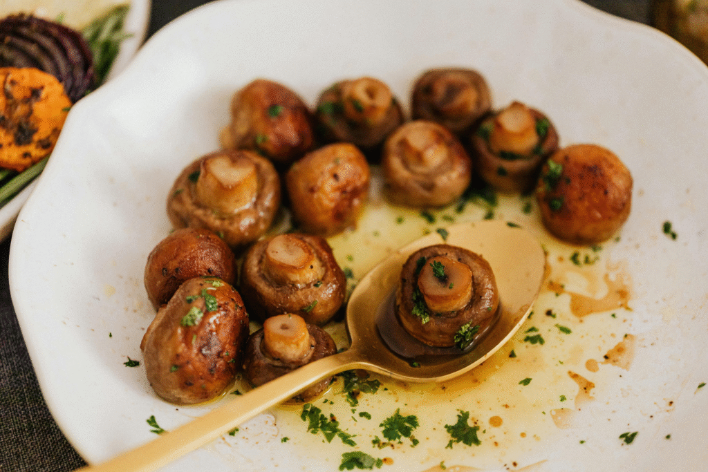 Air Fryer Garlic Mushrooms in a Dish Ready to eat
