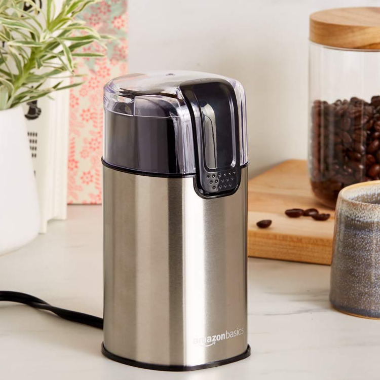 Amazon Basics Electric Coffee Grinder with some coffe