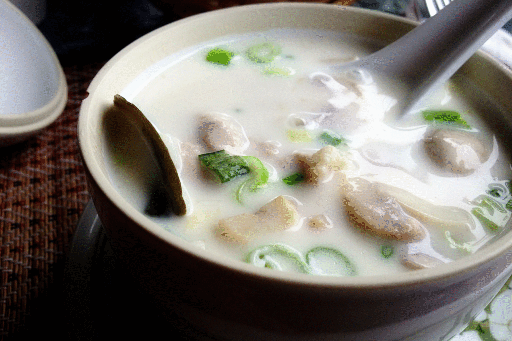Thai-Inspired Coconut Chicken Soup in a bowl