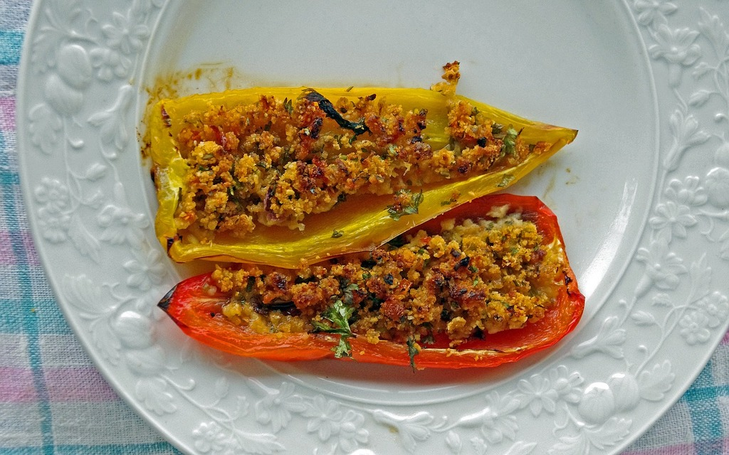 Stuffed Bell Peppers with ground Turkey in a dish.